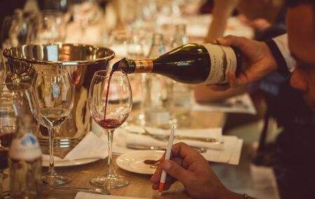 St. Petersburg, Russia-August 16, 2018: wine Tectonia by Volcanes, poured into glasses for tasting.のeditorial素材