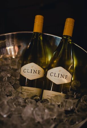 St. Petersburg, Russia-August 16, 2018: bottles of Cline Vionier wine in an ice bowl. Preparation for wine training for sommeliers.のeditorial素材