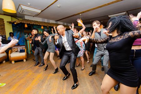 Moscow, Russia-January 19, 2019: Cuban dance teachers conduct a master class in salsa and reggaeton in the night club Tiki bar.のeditorial素材