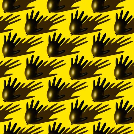 Seamless pattern of inflated black disposable surgical gloves. Symbol of hand protection during the pandemic and victory over the coronavirus.の写真素材