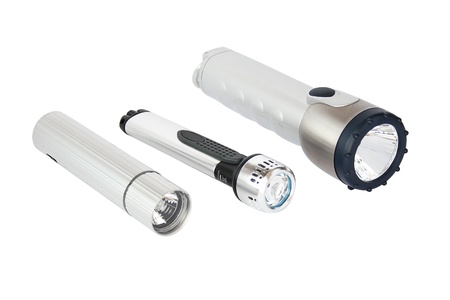 three flashlights isolated on the white backgroundの写真素材