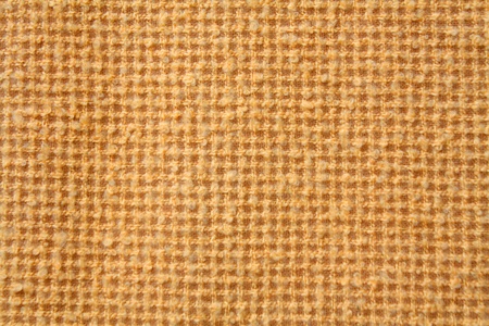 orange rug fabric texture as a backgroundの写真素材