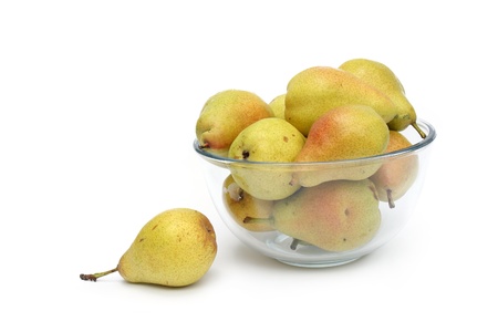 yellow pears on glass dish isolated on a whiteの写真素材