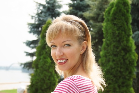 close up portrait of a pretty young woman outdoorの写真素材