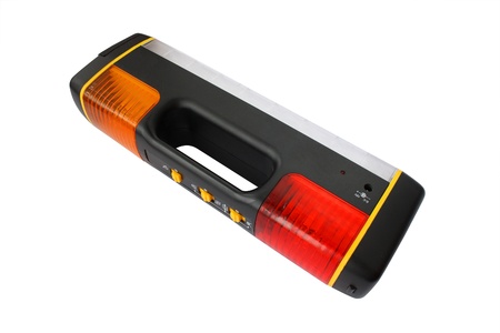 multifunction flashlight with yellow and red signal isolated over whiteの写真素材
