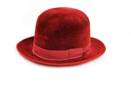 vintage 50 years old red hat, made in USSR, over white backgroundの写真素材