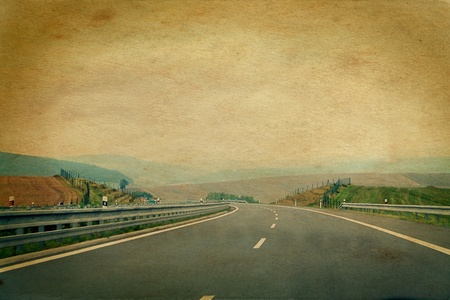 windy road picture aged and damaged in retro styleの写真素材
