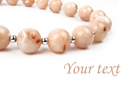 beads necklace close-up on white backgroundの写真素材