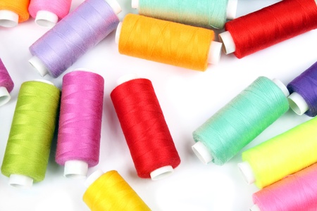 few nice colorful bobbins as a backgroundの写真素材