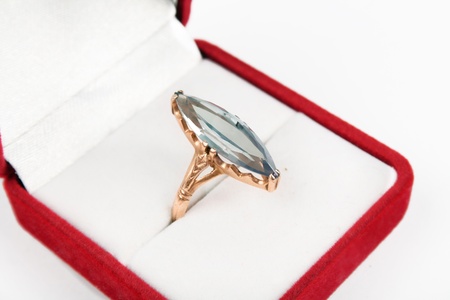 ring with big stone in a red box isolated over whiteの写真素材