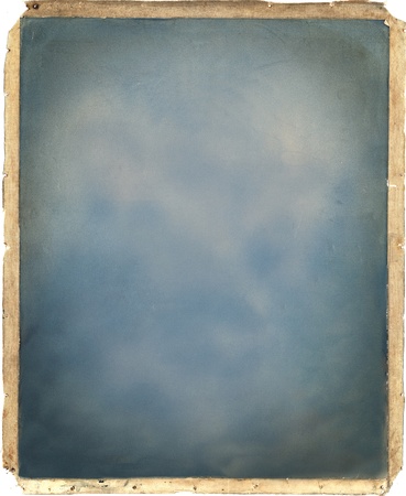 blue background of vintage old photopaper with canvas frameの写真素材