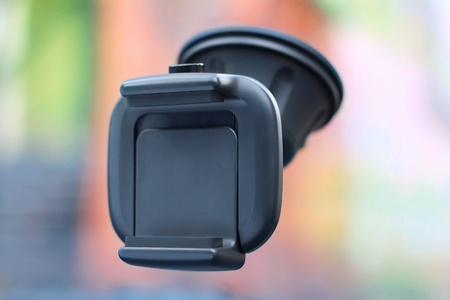 Car holder for mobile device sticked on glassの写真素材