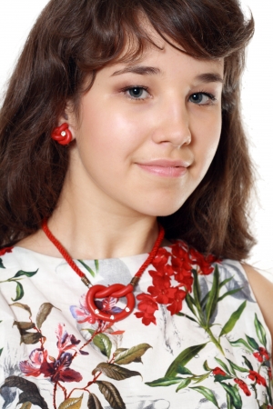 Teen girl beautiful portrait with long brown hair and dress. isolated on white backgroundの写真素材