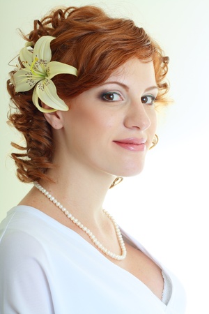 beauty woman portrait of woman with perfect make up and flower in hairの写真素材