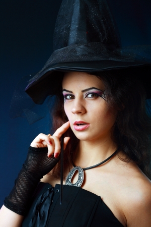 pretty young brunette woman dressed as a fairy with magic wand cosplay characterの写真素材