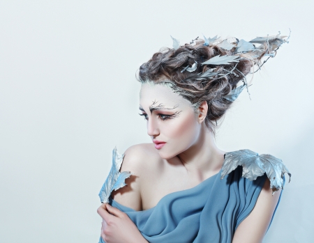 beatiful high fasion female model with fantasy hair style and art make up nature conceptの写真素材
