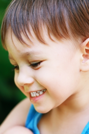 Little Boy Laughing. Kid Over Nature Green Background.Outdoorの写真素材