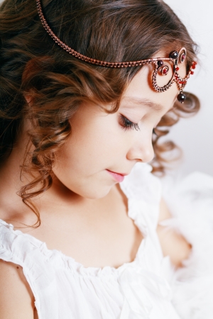 little princess close up beautiful cute girl wearing diademの写真素材