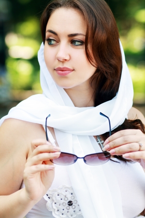 Beautiful young woman in sunglasses. Outdoor portraitの写真素材