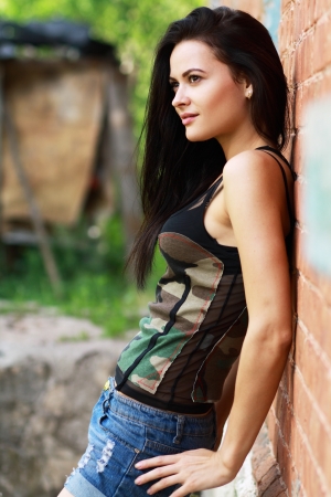 Yang and beautiful sexy woman poses outdoor countrysideの写真素材