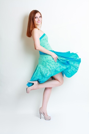 Attractive Young Woman in Bright Blue Dress の写真素材