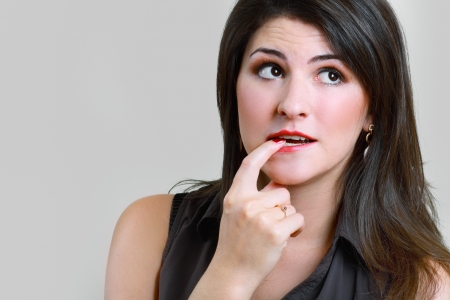 Portrait of an attractive plus size young brunette womanの写真素材