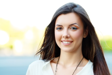 Portrait Of Young Smiling Beautiful Womanの写真素材