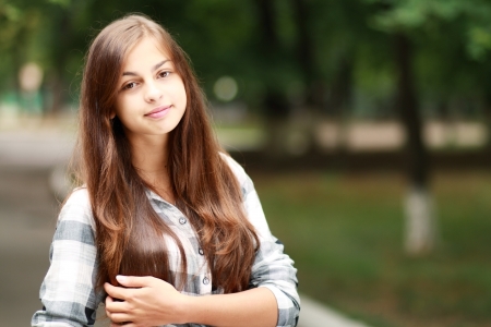 Schoolgirl Outdoor with book bag. Back to School.の写真素材