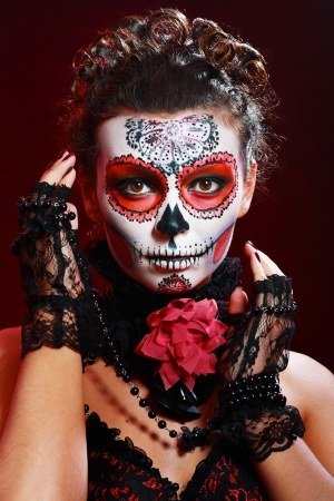 halloween make up sugar skull beautiful model with perfect hairstyle. Santa Muerte concept.の写真素材