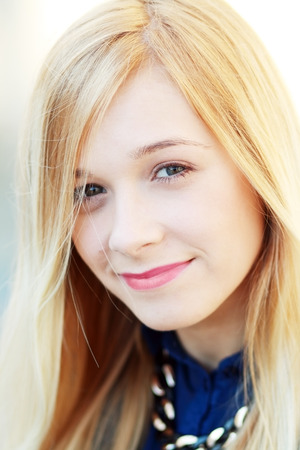 Closeup portrait of a happy blonde woman. Copyspaceの写真素材