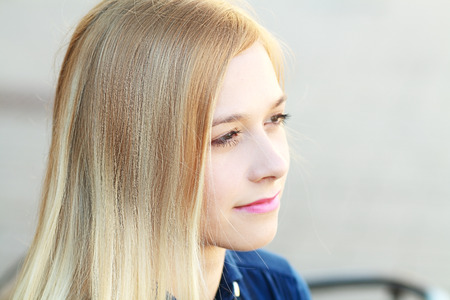 Closeup portrait of a happy blonde woman. Copyspaceの写真素材