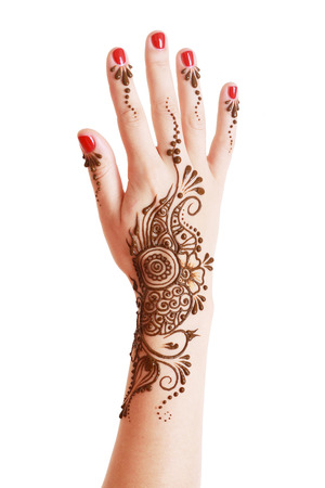 Image detail of henna being applied to hand isolated over whiteの写真素材