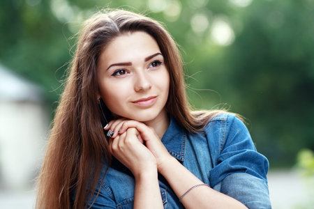 Portrait Of Young Smiling Beautiful Womanの写真素材