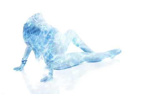 beautiful blond woman double exposure with water sparksの写真素材
