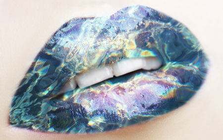 Beautiful red glossy lips close-up, macro photography double exposure combined with photograph of water. Spa, beauty, cosmetic conseptの写真素材