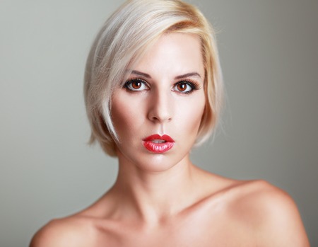 beautiful blond woman with short haircut with perfect skin fashionの写真素材