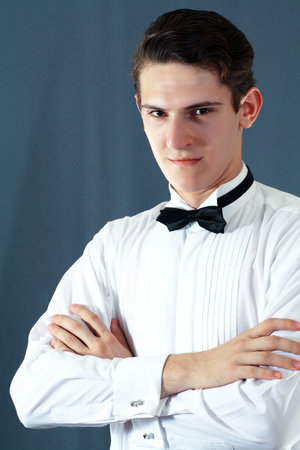 man in a shirt and bow tie