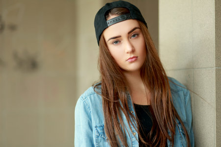 beautiful teen woman outdoor portrait serious face
