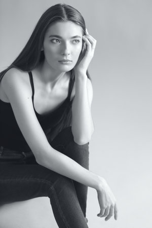 studio portrait of the beautiful young woman with long hair monochrome black and whiteの写真素材