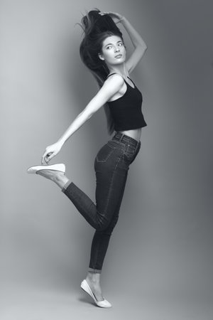 studio portrait of the beautiful young woman with long hair monochrome black and whiteの写真素材