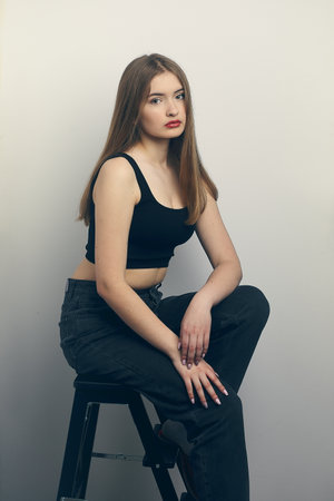 beautiful teenage girl posing on studio portraitの写真素材