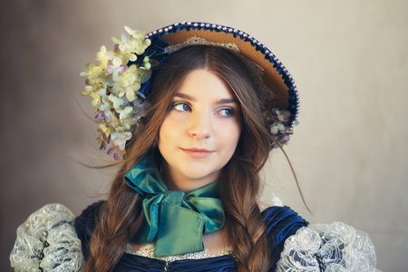 Young teenage woman portrait regency era bonnet hat close upの写真素材