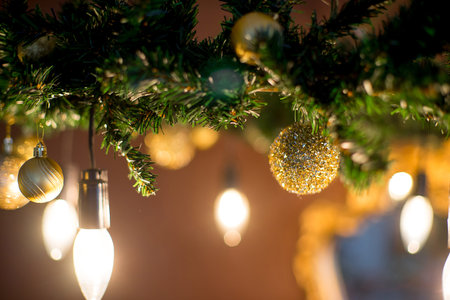 Christmas tree, mirror, chandelier. Christmas interior in purple and gold colors