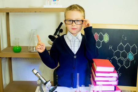 young boy making science experiments in laboratory. educationの写真素材
