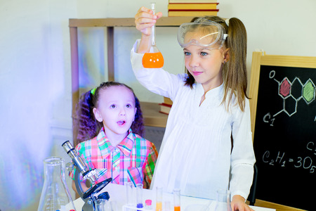 kids making science experiments in laboratory. educationの写真素材