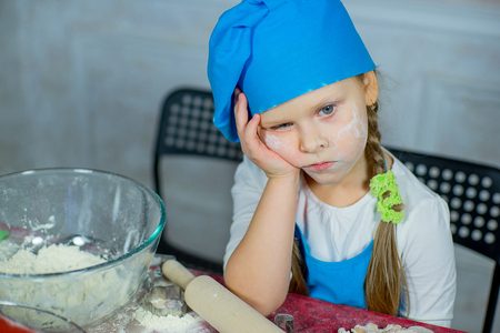 kid baking christmas cookies before the celebration of Christmas. Familyの写真素材