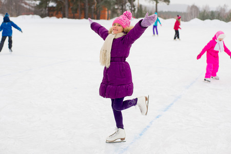 young skater girl on the iceの写真素材
