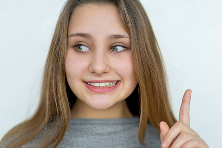 Teenager girl emotional posing isolatedの写真素材