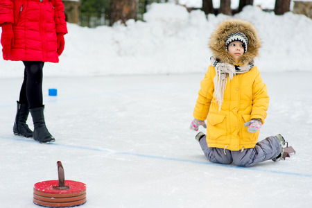 Young girls playing curlingの写真素材