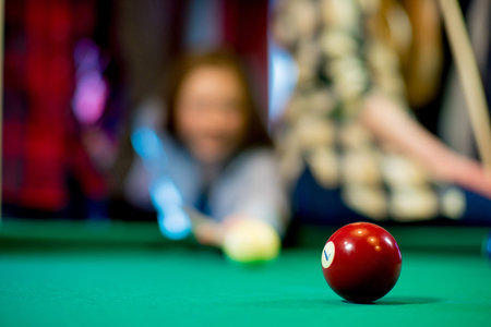 friends playing billiard